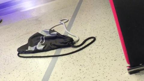 Candid sneakers step on bag